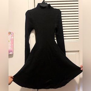 Black turtleneck dress. Size small. Can be used for a 9 year old.